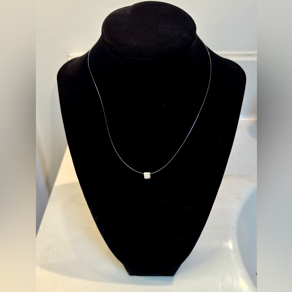 Vintage floating silver-toned square with rhinestone necklace.